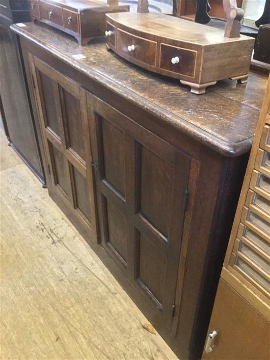 Late 18thC panelled oak two door cupboard